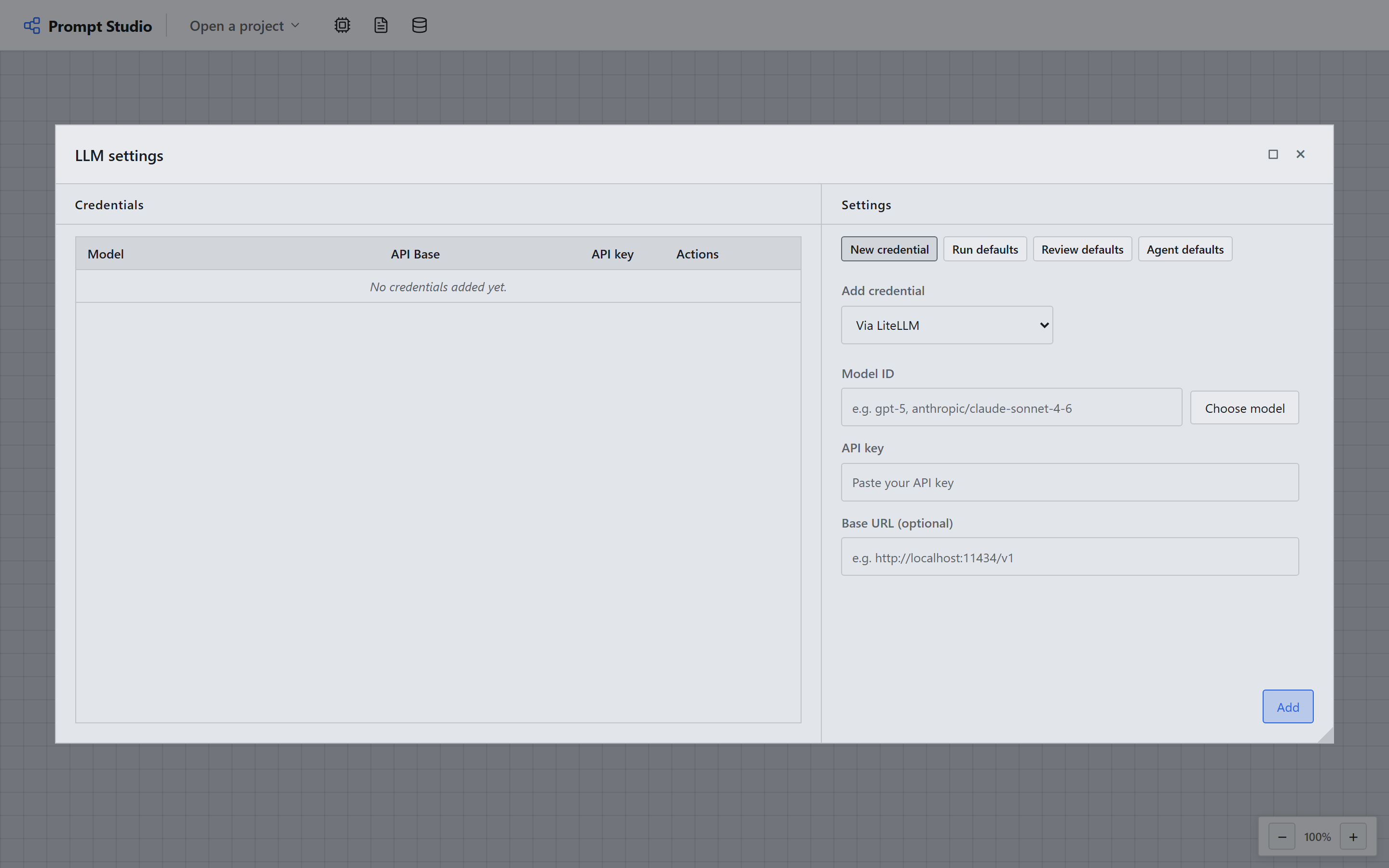 LLM settings, empty state: two ways to add a credential, a LiteLLM model ID or an OpenRouter account connection.